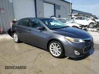 2013 Toyota Avalon XLE with VIN 4T1BK1EB6DU013820, listed as a Copart auction lot 50598635 with 165,466 mi miles and Salvage Title. Bid and sale history available at DreamBid. Image 4.