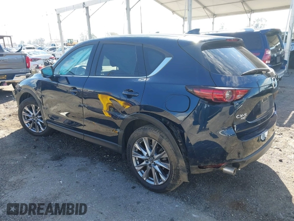 2020 Mazda CX-5 Grand Touring with VIN JM3KFBDM8L0807555, listed as a IAAI auction lot 41612906 with 40,518 mi miles. Bid and sale history available at carsss.com. Image 3.