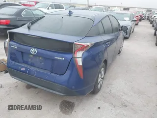 2018 Toyota Prius Two with VIN JTDKARFU4J3064739, listed as a IAAI auction lot 41918080 with 103,664 mi miles. Bid and sale history available at carsss.com. Image 4.