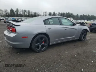 2013 Dodge Charger SXT with VIN 2C3CDXHG3DH614784, listed as a Copart auction lot 51660985 with 96,733 mi miles and Salvage Title. Bid and sale history available at carsss.com. Image 3.