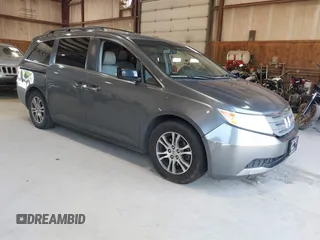 2011 Honda Odyssey EX-L with VIN 5FNRL5H65BB051888, listed as a IAAI auction lot 42594902 with 222,034 mi miles and . Bid and sale history available at DreamBid. Image 1.