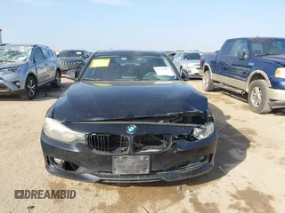 2013 BMW 3 Series 328i with VIN WBA3C1C51DF440679, listed as a IAAI auction lot 41533587 with 184,812 mi miles. Bid and sale history available at carsss.com. Image 12.