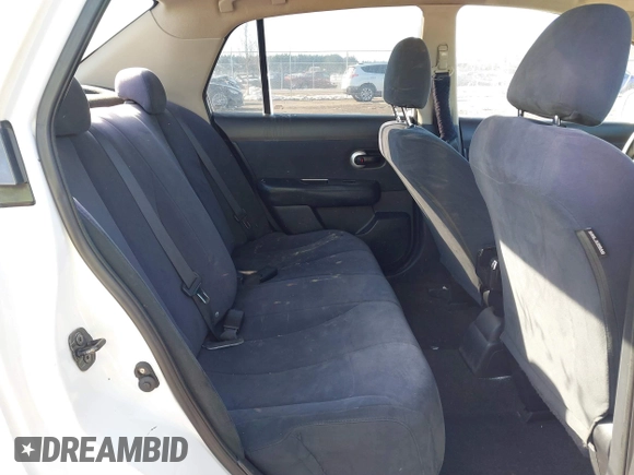 2009 Nissan Versa S with VIN 3N1BC11E19L394465, listed as a IAAI auction lot 41346553 with 159,983 mi miles and . Bid and sale history available at DreamBid. Image 8.