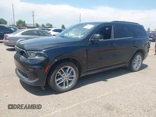 2023 Dodge Durango GT Plus with VIN 1C4RDJDGXPC688087, listed as a IAAI auction lot 42685018 with 58,999 mi miles and . Bid and sale history available at DreamBid. Image 2.