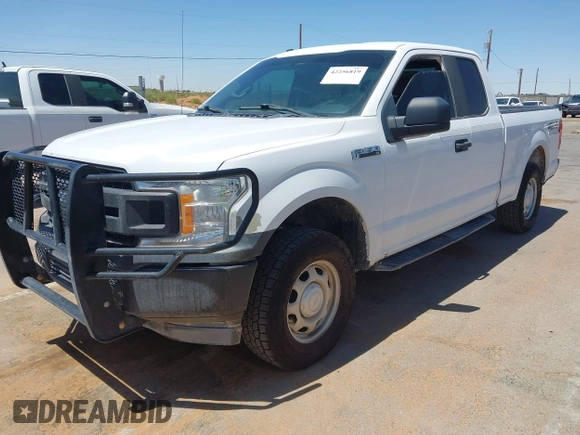 2018 Ford F-150 XL with VIN 1FTFX1E5XJKD86996, listed as a IAAI auction lot 42256819 with 141,798 mi miles and . Bid and sale history available at DreamBid. Image 2.