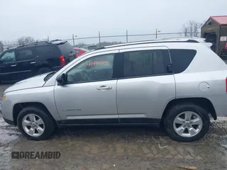 2013 Jeep Compass Sport with VIN 1C4NJCBA8DD264902, listed as a IAAI auction lot 41440255 with 144,877 mi miles. Bid and sale history available at carsss.com. Image 14.