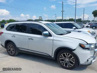 2016 Mitsubishi Outlander SE with VIN JA4AD3A34GZ021310, listed as a IAAI auction lot 40411249 with 118,599 mi miles. Bid and sale history available at carsss.com. Image 13.