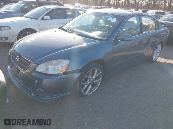 2002 Nissan Altima SE with VIN 1N4BL11E62C115936, listed as a IAAI auction lot 41593574 with 999,999 mi miles. Bid and sale history available at carsss.com. Image 2.