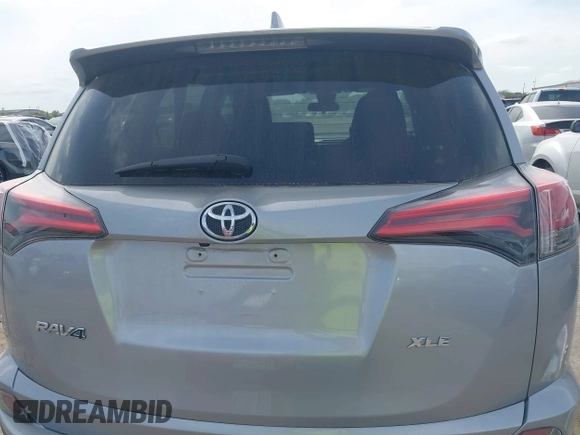 2018 Toyota RAV4 XLE z VIN 2T3WFREV5JW466294, wystawiony jako IAAI lot #41841436 z przebiegiem 132 150 mil mil oraz . Historia ofert i sprzedaży dostępna na DreamBid. Obrazek 16.