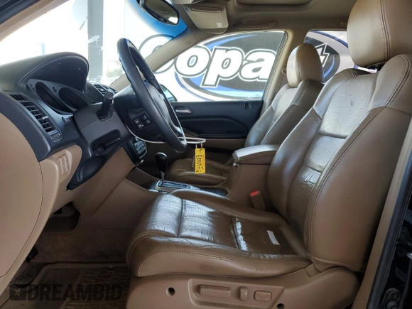 2006 Acura MDX Touring z VIN 2HNYD18896H507470, wystawiony jako Copart lot #53324315 z przebiegiem 184 313 mil mil oraz Szkoda całkowita • Salvage title. Historia ofert i sprzedaży dostępna na DreamBid. Obrazek 7.