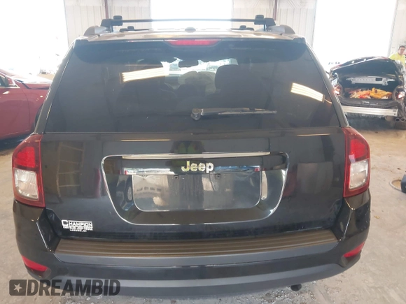2016 Jeep Compass Sport z VIN 1C4NJCBA7GD621393, wystawiony jako IAAI lot #42640609 z przebiegiem 130 885 mil mil oraz . Historia ofert i sprzedaży dostępna na DreamBid. Obrazek 16.