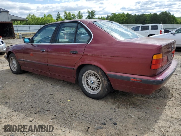 1995 BMW 5 Series 525i z VIN WBAHD632XSGK86387, wystawiony jako Copart lot #58245795 z przebiegiem 168 925 mil mil oraz Czysty tytuł • Clean title. Historia ofert i sprzedaży dostępna na DreamBid. Obrazek 2.