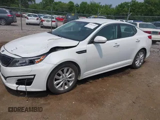 2015 Kia Optima LX with VIN 5XXGM4A71FG356034, listed as a IAAI auction lot 42402142 with 131,376 mi miles and . Bid and sale history available at DreamBid. Image 2.