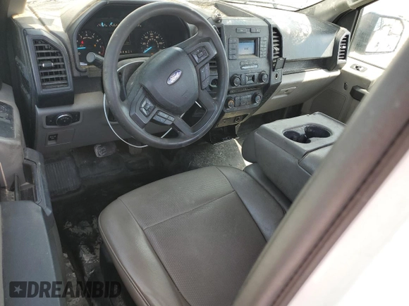 2018 Ford F-150 XL with VIN 1FTMF1CB2JKC31099, listed as a Copart auction lot 52078995 with 219,569 mi miles and Salvage title. Bid and sale history available at DreamBid. Image 8.