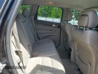 2013 Jeep Grand Cherokee Laredo with VIN 1C4RJEAG2DC519570, listed as a Copart auction lot 52066225 with 129,091 mi miles and Salvage Title. Bid and sale history available at carsss.com. Image 11.