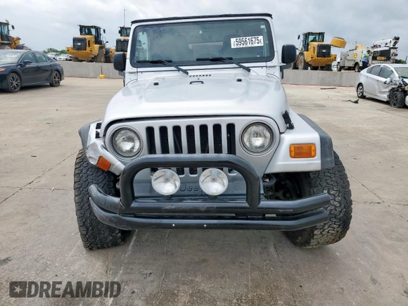 2004 Jeep Wrangler X z VIN 1J4FA39S34P702186, wystawiony jako Copart lot #59561675 z przebiegiem 202 214 mil mil oraz Szkoda całkowita • Salvage title. Historia ofert i sprzedaży dostępna na DreamBid. Obrazek 5.
