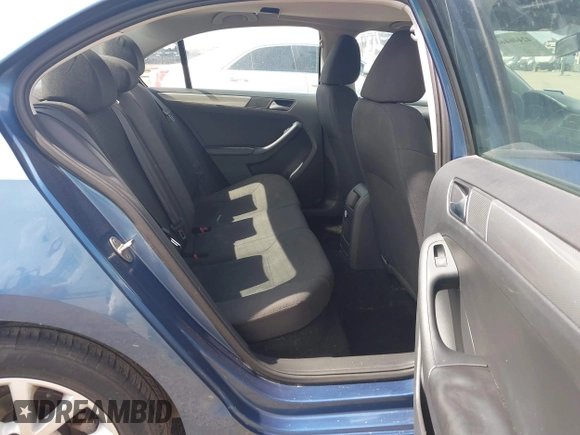 2015 Volkswagen Jetta SE z VIN 3VWD17AJ0FM301191, wystawiony jako IAAI lot #42446461 z przebiegiem 162 000 mil mil oraz . Historia ofert i sprzedaży dostępna na DreamBid. Obrazek 8.