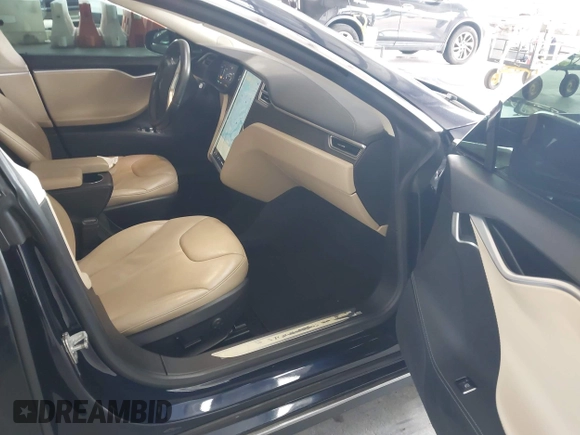 2014 Tesla Model S 60 с VIN 5YJSA1H11EFP60357, выставлен на аукционе IAAI как лот 42656130 с пробегом 133 344 миль миль и . История ставок и продаж доступна на DreamBid. Изображение 5.