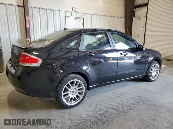 2009 Ford Focus SES with VIN 1FAHP36N49W189173, listed as a Copart auction lot 61967564 with 82,587 mi miles and Salvage Title. Bid and sale history available at carsss.com. Image 3.