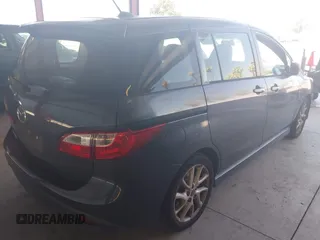 2012 Mazda 5 Touring with VIN JM1CW2CLXC0111947, listed as a IAAI auction lot 42690065 with 116,308 mi miles and . Bid and sale history available at DreamBid. Image 4.