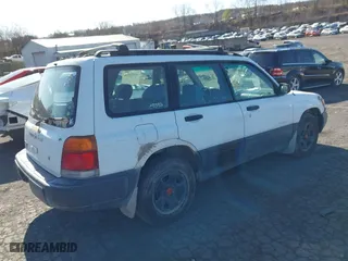 1999 Subaru Forester L with VIN JF1SF6355XH741974, listed as a IAAI auction lot 41973316 with 215,779 mi miles. Bid and sale history available at carsss.com. Image 4.