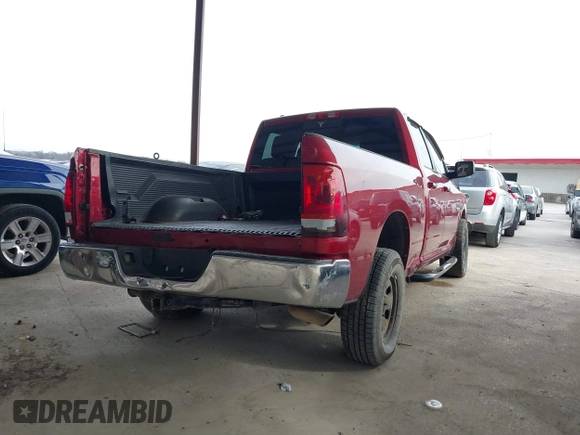 2013 Ram 1500 SLT z VIN 1C6RR7GP5DS651182, wystawiony jako IAAI lot #41551602 z przebiegiem Nie podano mil oraz . Historia ofert i sprzedaży dostępna na DreamBid. Obrazek 4.