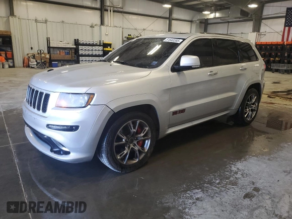 2012 Jeep Grand Cherokee SRT8 with VIN 1C4RJFDJ2CC105829, listed as a Copart auction lot 51840385 with 142,146 mi miles and Clean Title. Bid and sale history available at carsss.com. Image 1.