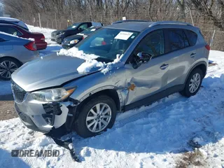2013 Mazda CX-5 Touring with VIN JM3KE2CE7D0129623, listed as a IAAI auction lot 41344623 with 147,025 mi miles. Bid and sale history available at carsss.com. Image 18.
