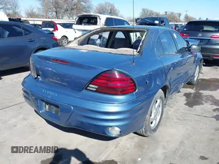 1999 Pontiac Grand Am SE1 with VIN 1G2NE52E6XM791901, listed as a IAAI auction lot 41397903 with 61,349 mi miles. Bid and sale history available at carsss.com. Image 4.