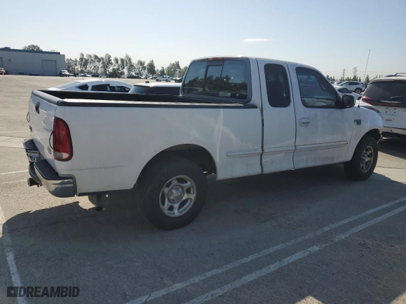 1998 Ford F-150 Standard with VIN 1FTZX1768WNB12818, listed as a Copart auction lot 51514435 with 239,160 mi miles and Salvage Title. Bid and sale history available at carsss.com. Image 3.