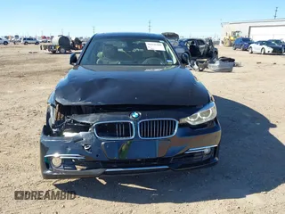 2012 BMW 3 Series 328i with VIN WBA3A5C58CF256254, listed as a IAAI auction lot 41676209 with 68,893 mi miles. Bid and sale history available at carsss.com. Image 13.