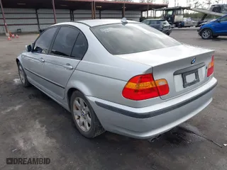 2005 BMW 3 Series 325i with VIN WBAAZ33415KW79070, listed as a IAAI auction lot 41708871 with 148,876 mi miles. Bid and sale history available at carsss.com. Image 3.
