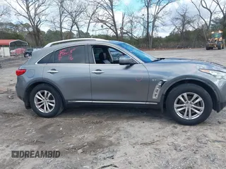 2015 Infiniti QX70 with VIN JN8CS1MWXFM480906, listed as a IAAI auction lot 41177811 with 176,527 mi miles and . Bid and sale history available at DreamBid. Image 13.
