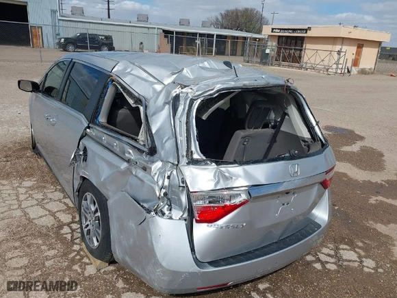 2012 Honda Odyssey EX-L with VIN 5FNRL5H64CB136514, listed as a IAAI auction lot 41837755 with 175,844 mi miles. Bid and sale history available at carsss.com. Image 6.