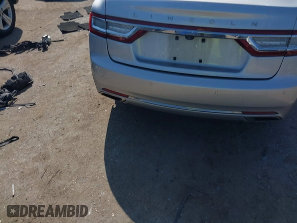 2018 Lincoln Continental Premiere z VIN 1LN6L9PK5J5603376, wystawiony jako IAAI lot #41880976 z przebiegiem Nie podano mil oraz . Historia ofert i sprzedaży dostępna na DreamBid. Obrazek 15.