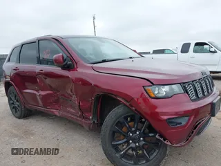 2018 Jeep Grand Cherokee Altitude with VIN 1C4RJEAGXJC281236, listed as a IAAI auction lot 42378899 with 102,276 mi miles and . Bid and sale history available at DreamBid. Image 6.