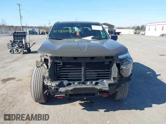 2023 GMC Canyon 4WD AT4 with VIN 1GTP6DEK1P1174713, listed as a IAAI auction lot 41733242 with 35,705 mi miles. Bid and sale history available at carsss.com. Image 12.