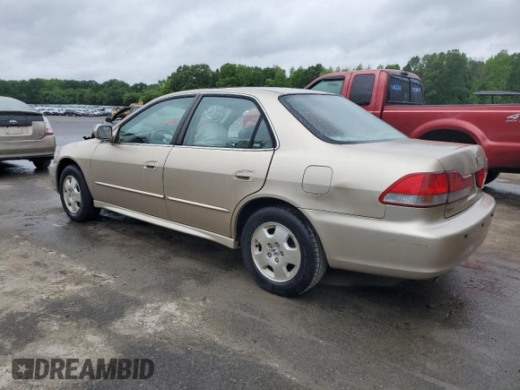 2002 Honda Accord EX z VIN 1HGCG16502A054396, wystawiony jako Copart lot #57170895 z przebiegiem 62 744 mil mil oraz Szkoda całkowita • Salvage title. Historia ofert i sprzedaży dostępna na DreamBid. Obrazek 2.