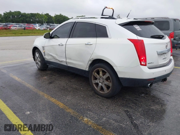 2012 Cadillac SRX Performance Collection with VIN 3GYFNEE33CS528697, listed as a IAAI auction lot 41374060 with 157,319 mi miles and . Bid and sale history available at DreamBid. Image 3.