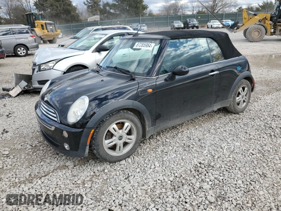 2005 MINI Convertible with VIN WMWRF33485TG11549, listed as a Copart auction lot 87285984 with 58,934 mi miles and Salvage title. Bid and sale history available at DreamBid. Image 1.