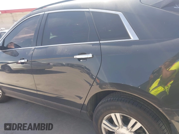 2014 Cadillac SRX z VIN 3GYFNAE35ES610751, wystawiony jako IAAI lot #41832296 z przebiegiem 133 293 mil mil oraz . Historia ofert i sprzedaży dostępna na DreamBid. Obrazek 14.