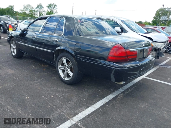 2003 Mercury Grand Marquis LS Premium with VIN 2MEHM75W23X672191, listed as a IAAI auction lot 42198997 with 137,525 mi miles and . Bid and sale history available at DreamBid. Image 3.