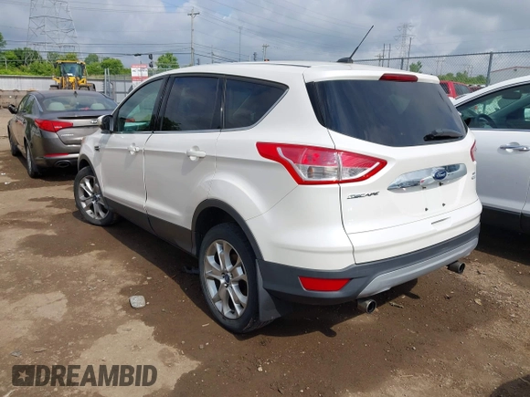 2013 Ford Escape SEL with VIN 1FMCU9HX6DUB14053, listed as a IAAI auction lot 42361297 with 144,861 mi miles and . Bid and sale history available at DreamBid. Image 3.