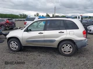 2001 Toyota RAV4 with VIN JTEGH20V810013042, listed as a IAAI auction lot 42321163 with 152,535 mi miles and . Bid and sale history available at DreamBid. Image 14.