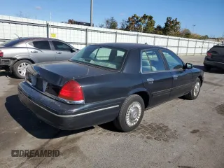 2001 Ford Crown Victoria Police Police Interceptor with VIN 2FAFP71W41X205475, listed as a Copart auction lot 75265194 with 117,633 mi miles and Salvage Title. Bid and sale history available at carsss.com. Image 3.
