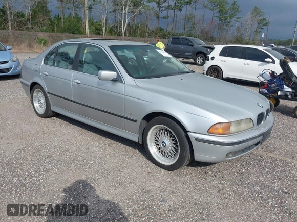 2000 BMW 5 Series 528iA with VIN WBADM6344YGU22084, listed as a IAAI auction lot 41734099 with 249,650 mi miles. Bid and sale history available at carsss.com. Image 1.