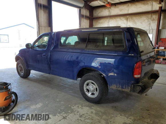 1997 Ford F-150 z VIN 1FTDF18W0VLB11829, wystawiony jako Copart lot #69103414 z przebiegiem 291 277 mil mil oraz Czysty tytuł • Clean title. Historia ofert i sprzedaży dostępna na DreamBid. Obrazek 2.