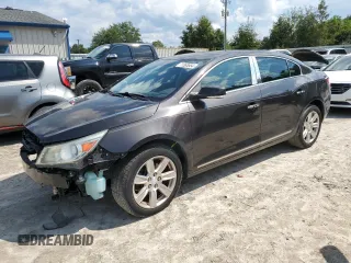 2013 Buick LaCrosse Premium 1 with VIN 1G4GF5E30DF208682, listed as a Copart auction lot 71568954 with 125,640 mi miles and Salvage Title. Bid and sale history available at carsss.com. Image 1.