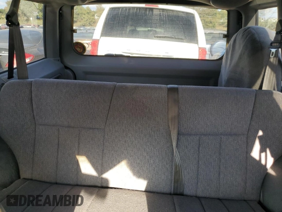 1998 Jeep Cherokee Sport with VIN 1J4FT68S4WL121559, listed as a Copart auction lot 77387794 with 163,453 mi miles and Salvage Title. Bid and sale history available at carsss.com. Image 10.
