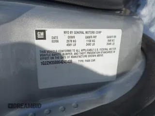 2006 Pontiac G6 GT with VIN 1G2ZH358864245408, listed as a IAAI auction lot 41609030 with 153,168 mi miles and . Bid and sale history available at DreamBid. Image 9.